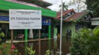 Untuk Sementara Puskesmas Purnama tidak dapat layani pasien akibat banjir