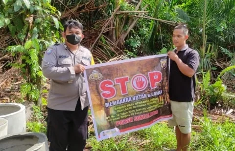 Bhabinkamtibmas Polsek Sungai Raya Lakukan Sosialisasikan Stop Membakar Hutan Kepelosok Desa