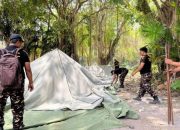 Terbangun Sinergi Harmonis, Banser-Pecalang Kompak Bersih-Bersih Lokasi Apel Kesetiaan PBNU