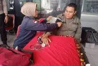 Tim Kesehatan Polres Kubu Raya Berikan Layanan Kesehatan untuk Personel dan Pemudik. Foto/Istimewa. 