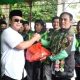 Bupati Sujiwo Beri Bingkisan Pengemudi Ojol dan Atlet Disabilitas
