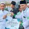 30 Anak Yatim di Desa Pasak Piang Terima Santunan dari NU Care-LAZISNU Kalbar dan Mahasiswa KKL IAIN Pontianak